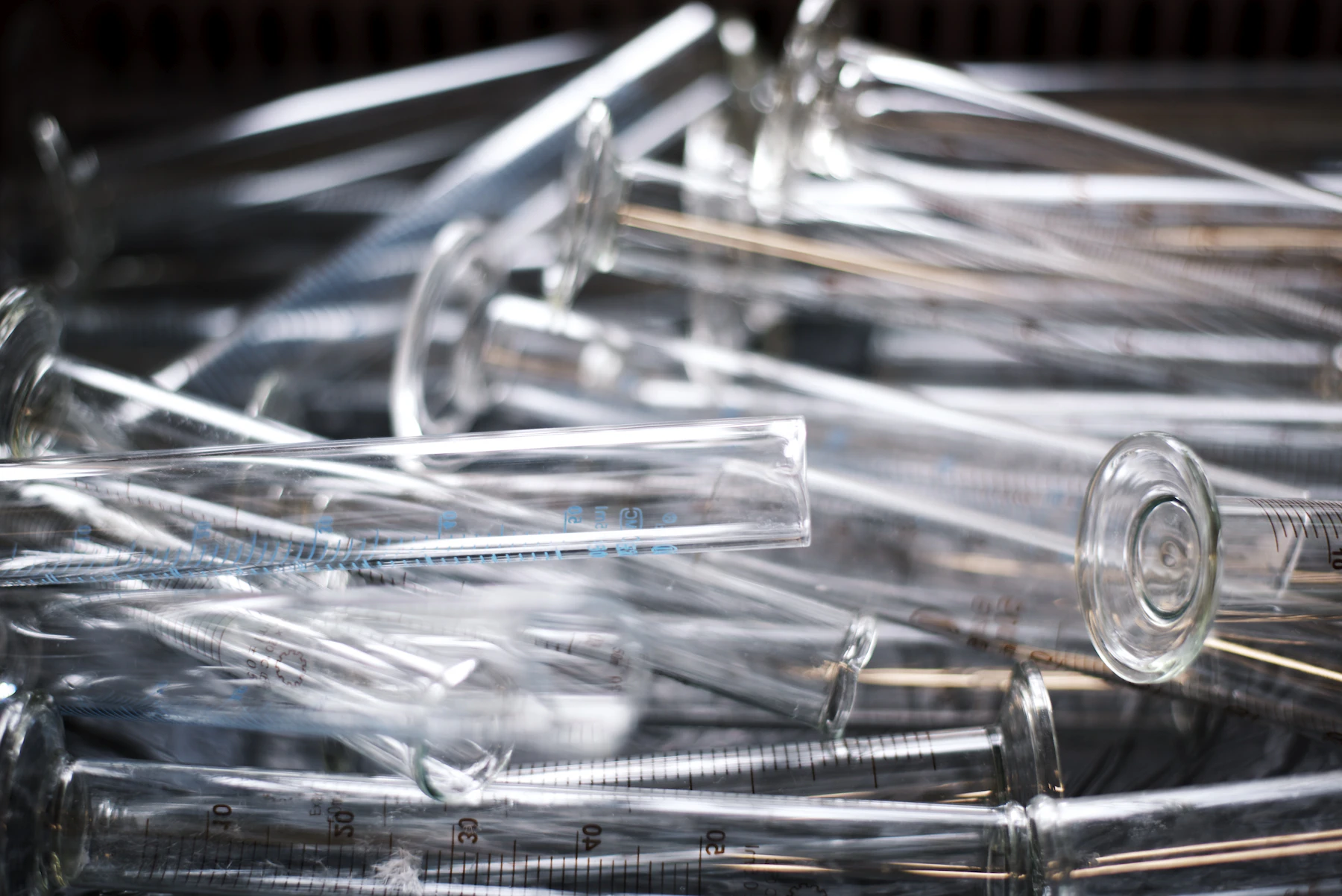 Clear graduated laboratory glassware